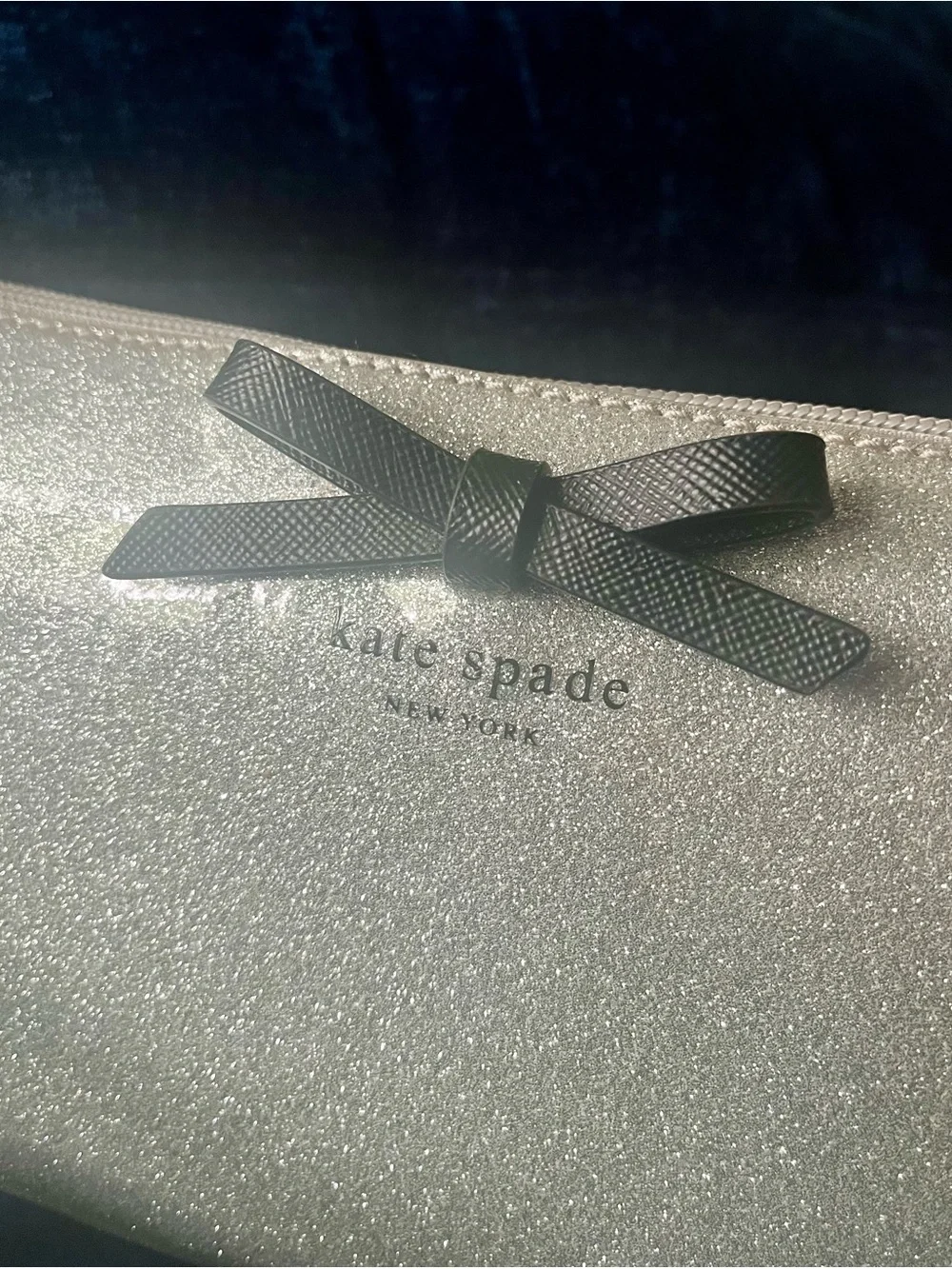 Kate Spade Silver Glitter Crossbody Bag with Bow Accent